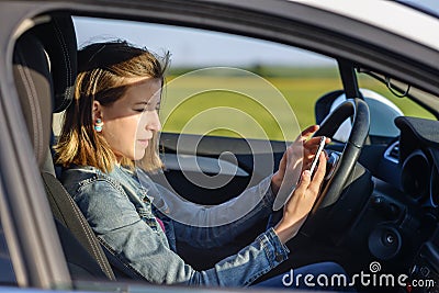Dangerous female driver Stock Photo