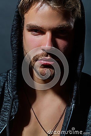 Dangerous gangster studio portrait on black. Crime face. Gang members on Danger crime district in night. Gangsta style Stock Photo