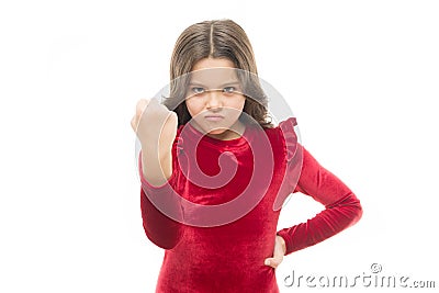 Dangerous girl. Feel my power. Girl kid threatening with fist isolated on white. Strong temper. Threatening with Stock Photo