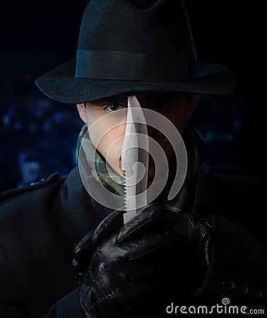 Dangerous man with a knife Stock Photo