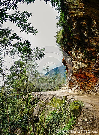 Dangerous mountain road in Bhutan Stock Photo