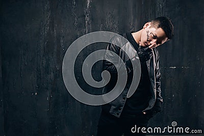 Dangerous tattooed ghetto gang member man Stock Photo