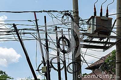 Dangerous and unsafe electricity wiring in seminyak bali indonesia on 11th december 2018 Editorial Stock Photo