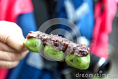 Dango - Japanese rice dumpling made of green tea and red bean Stock Photo