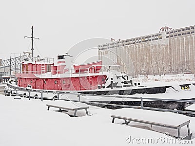 Daniel Mc Alister tugboat moored in Lachine canal on a cold winter day in Montreal Editorial Stock Photo
