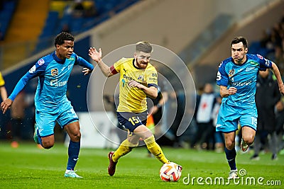 Danil Glebov of FC Rostov battle for the ball with Wilmar Barrios of FC Zenit St. Petersburg Editorial Stock Photo