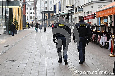 Danish police patrol street stroeget in Copenhagen Denmark Editorial Stock Photo