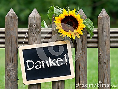 Danke sign on fence Stock Photo