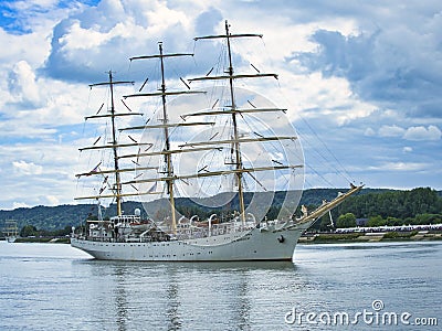 The Dar Mlodziezy, is a training ship from Gdynia, Poland. A Maritime University 3 mast Tall ship. It is navigating around the Editorial Stock Photo