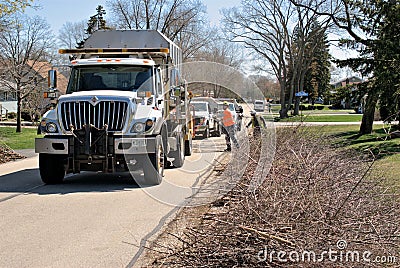 The city helps with Spring cleanup. It is a brush pickup week, a service provided by the city Editorial Stock Photo