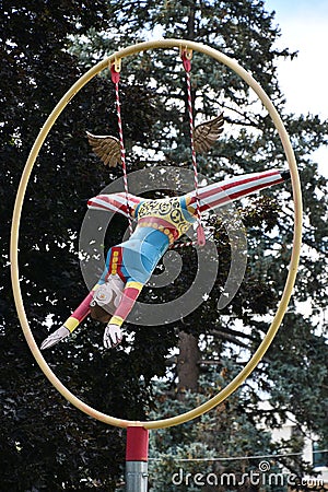 Daring Young Man on a Trapeze by Ric Blackerby at Bicentennial Park in Reno, Nevada Editorial Stock Photo