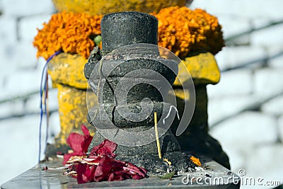 The hindu god siva is worshipped in lingam form. Stock Photo