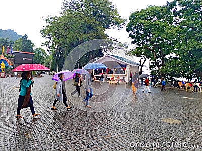 Darjeeling, West bengal, india, people walking in the streets of darjeeling mall road in a rainy day Editorial Stock Photo