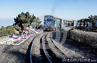 The tourists are enjoying a winter morning with toy train. Editorial Stock Photo