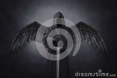 Dark angel with medieval sword Stock Photo