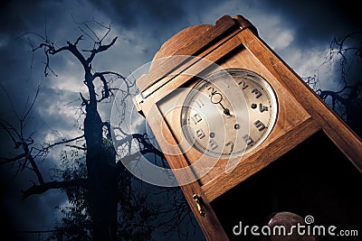 Dark antique clock at night Stock Photo