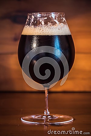 Dark Bamberg Smoked Beer in a Tulip Glass Stock Photo