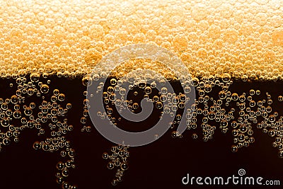 Dark beer with foam Stock Photo