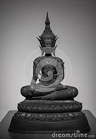 Dark black Buddha statue ancient art Editorial Stock Photo