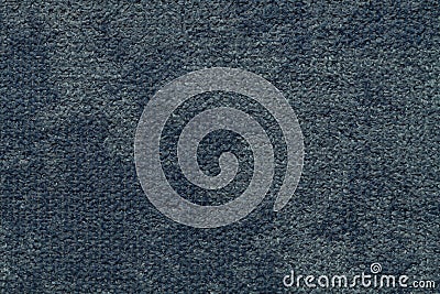 Dark blue fluffy background of soft, fleecy cloth. Texture of light nappy textile, closeup. Stock Photo