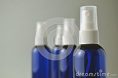 Dark blue glass bottles for cosmetic lotions, serums, oils Stock Photo