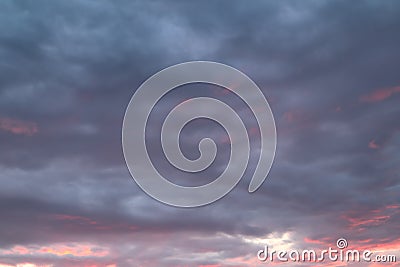 Dark, blue, orange cloud formations abstract nature background. Sky at sunset, orange cumulus clouds. Pink and red colored evening Stock Photo