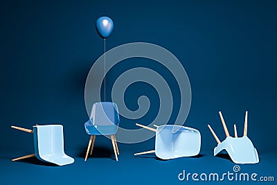 Dark blue room with chairs lying and one standing Stock Photo