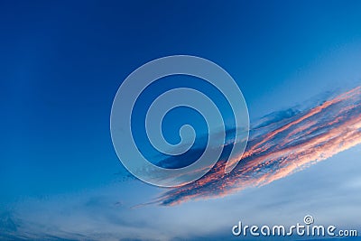 Dark blue sky before sunset with beautiful awesome clouds Stock Photo