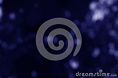 Dark bluebokeh,Dark blue background,Blurred nature bokeh for the background Stock Photo