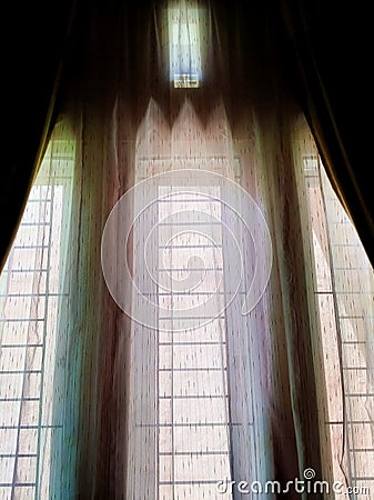 Dark and bright lights on windows and curtains Stock Photo