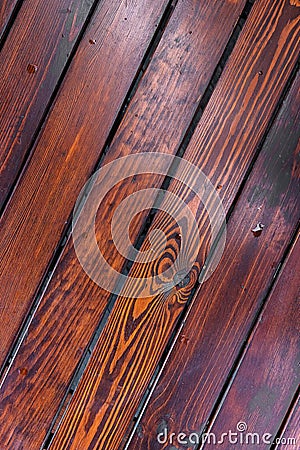 Dark brown boards background with spots. Old wet wood texture pattern after rain with reflections Stock Photo