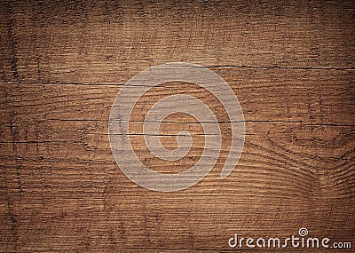 Dark brown scratched wooden cutting board. Wood Stock Photo