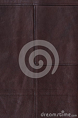 Dark brown stitched leather background. Stock Photo