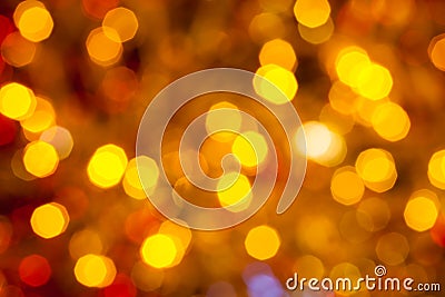 Dark brown yellow and red blurred Christmas lights Stock Photo