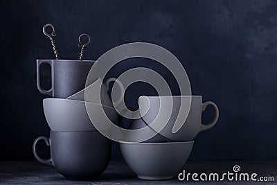 Dark ceramic kitchenware and utensils Stock Photo