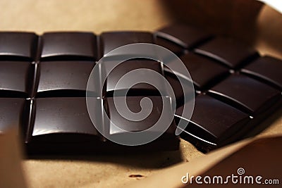 Dark chocolate bar in pack backround Stock Photo