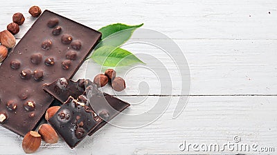 Dark chocolate with hazelnut nuts. Cacao. Stock Photo