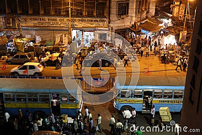 Dark city traffic blurred in motion at late evening on crowded streets in Kolkata Editorial Stock Photo