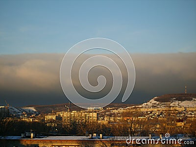 Dark clouds city Stock Photo