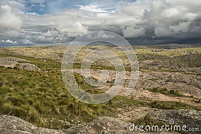 dark clouds over the mountainous desert Stock Photo