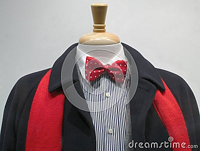 Dark coat with red scarf and bowtie Stock Photo