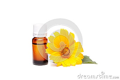 Dark cosmetic bottle of aromatic oil for herbal medicine with calendula flower isolated on white. Marigold extract. Stock Photo