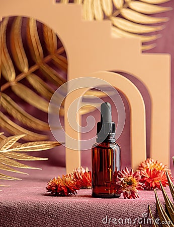 dark cosmetic container next to geometric shapes and palm leaves Stock Photo