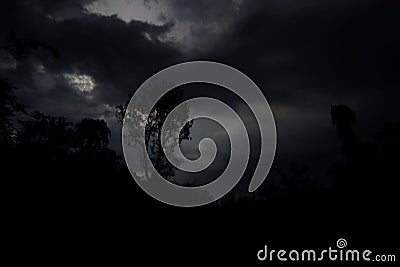 Dark and denser clouds covered the sky in the evening before a thunderstorm during the monsoon. Stock Photo