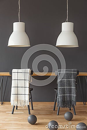 Dark dining room with blankets Stock Photo