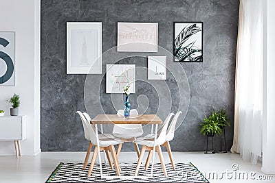 Dark dining room with gallery Stock Photo