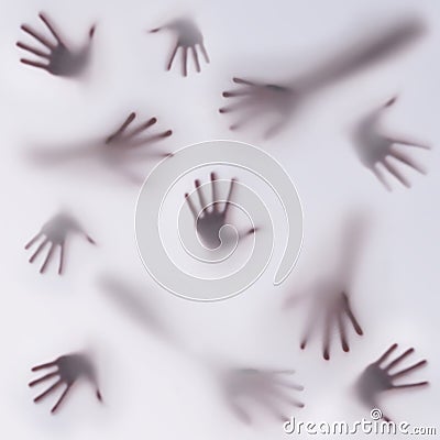 A frightening silhouette of many different hands Stock Photo