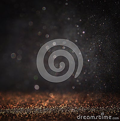 Dark glitter vintage lights background. light gold and black. defocused. Stock Photo