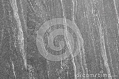 Dark gray granite smooth stone wall background Stock Photo