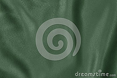 Dark green colored Background of soft draped fabric Stock Photo